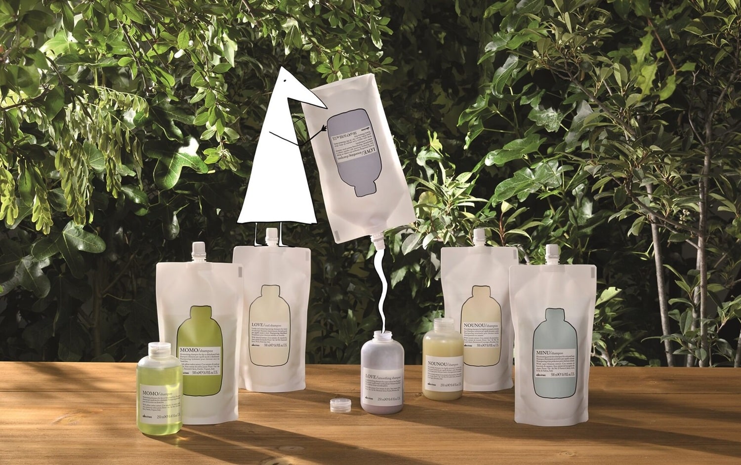  ESSENTIAL-REFILL-POUCHES_DEHC-man-filling-2-2-e1719320167972-min